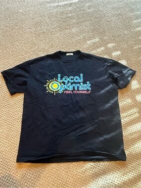 Madhappy Black "Local Optimist" Graphic Tee with Yellow & Blue Sun